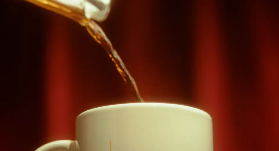 MORE THAN A COFFEE CUP — still 14